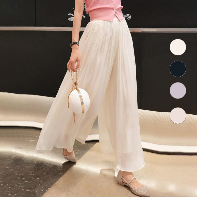 Anastasie Girard™ Pantaloni smaltati a gamba larga