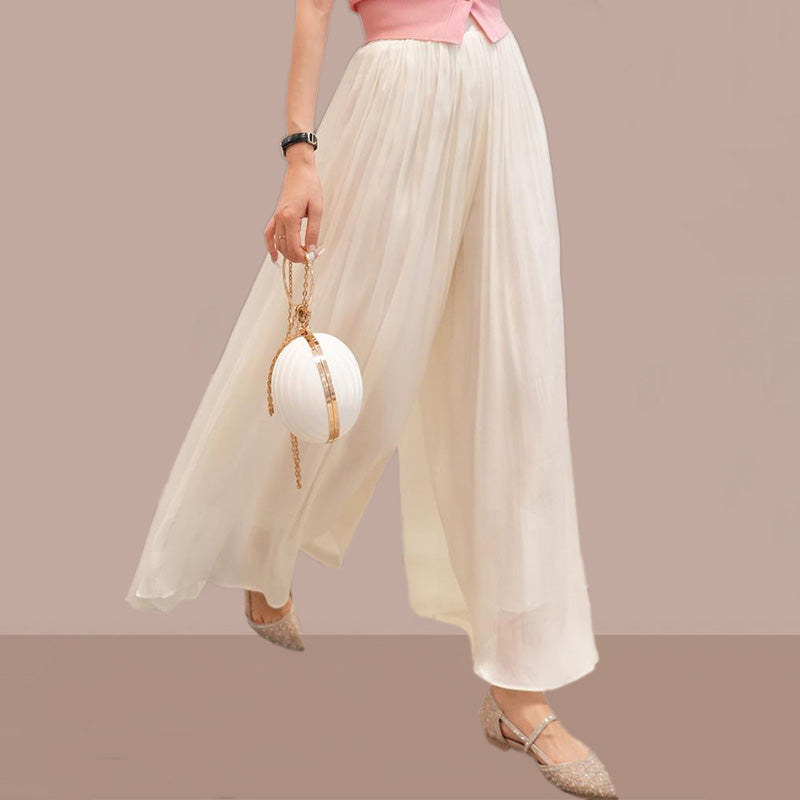 Anastasie Girard™ Pantaloni smaltati a gamba larga