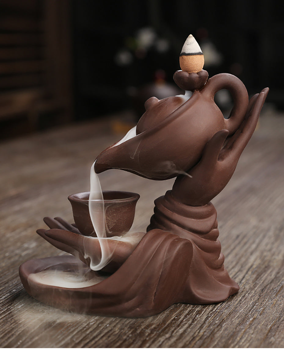 ZenFlow™ Teiera Buddha portatile per aromaterapia